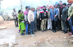 Mayor Harphool Kalyan at Mani Majra on Wednesday. He instructed officials to explore the possibility of constructing an underpass at the level crossing near Shitla Mata Mandir