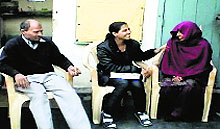 Geeta (centre) with her parents