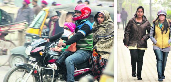 As temperature plummets, residents put on the extra layer of clothing to keep themselves warm.