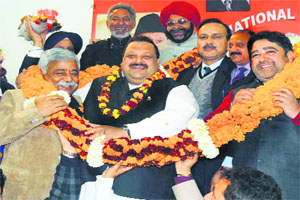 National Conference leader Devender Singh Rana (centre) along with party leaders after being unanimously re-elected the provincial president in Jammu on Wednesday. 