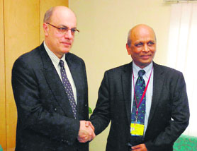 Commerce Secretary SR Rao (right) shakes hand with his Pakistani counterpart Qasim Niaz in New Delhi on Wednesday. 