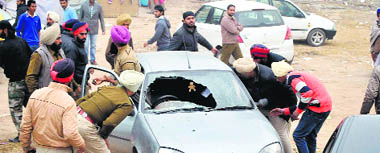 Police personnel arrive after a clash between two groups of YAD in Fatehgarh Sahib on Wednesday.