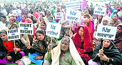 Villagers stage a protest at the Rally Ground, Sector 25, Chandigarh, on Thursday