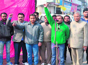 Former MLA Ambrish Kumar (extrem right) leads a protest against the rise in sewer taxes at the Chanracharya Square in Haridwar on Thursday