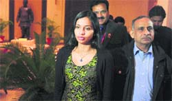 Devyani Khobragade with her father Uttam Khobragade (R) upon her arrival at Maharashtra Sadan, New Delhi, on January 10. Reuters