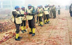 Policemen deployed in Bakal village of Kaithal district after a clash over panchayat land on Thursday. Photo by writer
