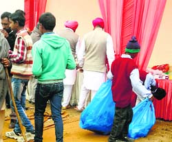 Chidren collect garbage at the residence of CPS Mantar Singh Brar in Faridkot district