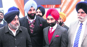 (From left) Deputy CM Sukhbir Badal, Minister Bikram Majithia and Shivinder Mohan of Fortis group in Ludhiana on Thursday.