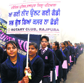 Students take out a rally to mark the National Road Safety Week in Rajpura on Thursday.
