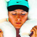 Sharapova cooling off during her match on Thursday.