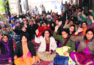 PCCTU teachers stage a protest against the management of Khalsa College in Amritsar on Friday. 