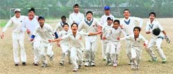 Players of the Guru Nanak Cricket Academy in a jubilant mood after defeating the Bharti Vij Cricket Academy during the ongoing 30-over League Cricket Tournament in Sector 36, Chandigarh, on Friday. Tribune photo: Parvesh Chauhan