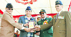 Ex-servicemen present a memento to Rajender Rana, MLA, in Sujanpur on Thursday.