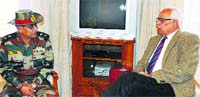 Major General Dushyant Singh, General Officer in Commanding, 26 Division, interacts with Governor NN Vohra at Raj Bhawan in Jammu on Friday. A Tribune photograph 