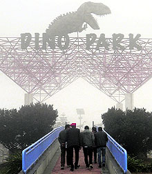 Visitors take a round of Pushpa Gujral Science City on a foggy morning in Kapurthala on Friday