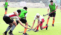 Players in action during a match of the 10th All-India Balwant Singh Kapur Hockey Tournament in Jalandhar on Friday