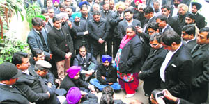 Lawyers protest outside the Police Commissioner's office in Ludhiana on Friday.