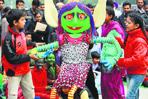 Children work on the theme of their production.