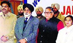 Hoshiarpur SSP Dr Narinder Bhargav, Education Minister SS Maluka, former minister Arunesh Shakar and DC Tanu Kashyap in Hoshiarpur on Friday