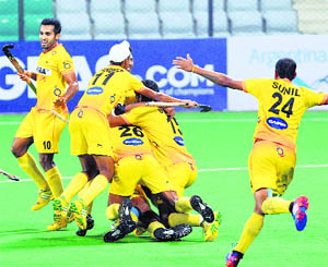 Indian players celebrate after winning the match. 