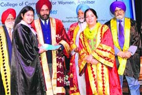 TPS Mann, Justice, Punjab and Haryana High Court, and Ranjit Singh Randhawa, Justice (retd), Punjab and Haryana High Court, give degrees to students at the convocation of SSSS College of Commerce for Women in Amritsar on Saturday