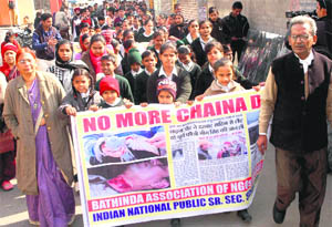 Members of various NGOs and schoolchildren stage a rally against the Chinese kite string in Bathinda on Saturday.