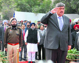 Chief Justice of the Punjab and Haryana High Court Sanjay Kishan Kaul takes salute during his visit to Bathinda on Saturday.