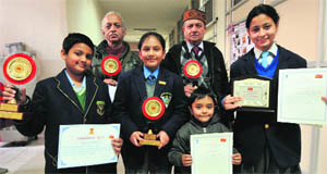 The winners with trophies on the concluding day of the philately exhibition, Chandipex-2014, at Panjab University on Saturday.