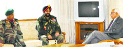 Chief of Army Staff Gen Bikram Singh and Northern Army Commander Lt Gen Sanjiv Chachra call on Governor NN Vohra at Raj Bhawan in Jammu on Saturday. A Tribune photo