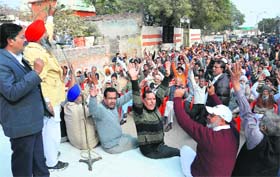 Residents of Paras Ram Nagar hold a protest in Bathinda on Sunday