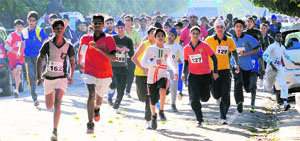 Participants run during the Yi Marathon held at Sector 68, Mohali, on Sunday.