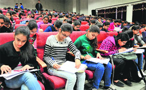 Students take a mock test organised at the Government Medical College & Hospital, Sector 32, Chandigarh, on Sunday. 