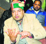 Youth Congress leader Amit Kumar Bharmouri addresses mediapersons in Chamba