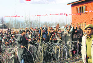 PDP, NC supporters raise slogans against each other at Tikipora in Kupwara district on Sunday.