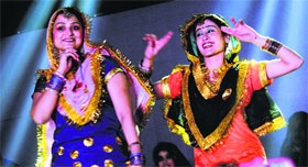 Residents present an item during the Lohri celebrations in Ludhiana.