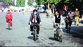 Mayor HS Gohalwaria takes part in a cycle rally on Sunday.