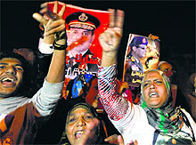 Supporters of Army chief Gen Abdel Fattah al-Sisi celebrate the passing of a new constitution at Tahrir Square in Cairo