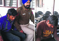 The accused being produced at a court on Monday. A Tribune photograph