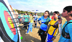 Players count their scores during the All- India Inter- University Archery Championship at the PU. tribune photo: Pradeep Mittal