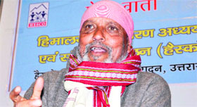 Dr Anil Joshi of HESCO addresses a press conference in Dehradun on Monday.