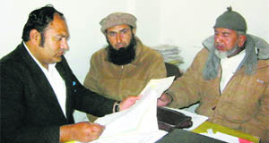 Mohammad Shakeel (C) with his brother-in-law Abdul Sattar andlocal advocate Momin Malik in Panipat. 