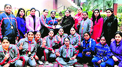 Powerlifting team of BBK DAV College for Women with Principal Dr Neelam Kamra on the college premises in Amritsar on Tuesday