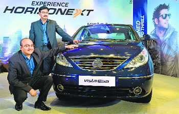 Tata Motors senior VP - passenger vehicle unit (commercial) Ankush Arora (L) and senior VP (passenger vehicle unit) Girish Wagh during the launch of Nano Twist and Vista Tech cars in Bangalore on Tuesday. The Vista range starts at ~4.96 lakh and goes up to ~6.11 lakh for VX Tech. Nano Twist comes with a power steering and new interiors at ~2.46 lakh.