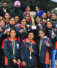 The softball women's team of Panjab University, Chandigarh, poses with their medals.