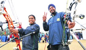 Trisha Devi and Kanwal Preet of Punjabi University, Patiala, in a jubilant mood after winning top positions in archery meet at the PU on Tuesday.