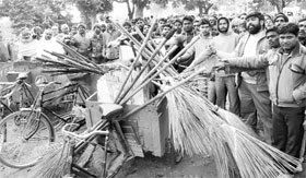 Municipal workers stop rehris of a contractor during the strike in Phase IX, Mohali, on Tuesday.