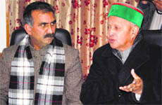 Chief Minister Virbhadra Singh with state Congress president Sukhvinder Singh Sukhu during an HPCC election committee meeting at party office in Shimla on Tuesday. 