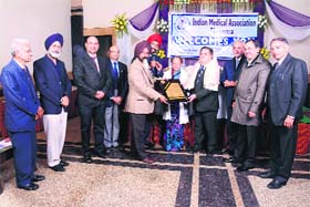 Physician Dr S Mahindra receives the lifetime achievement award in Phagwara
