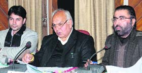 MP Mahinder Singh Kaypee (centre) during a meeting at the DC office in Jalandhar on Tuesday
