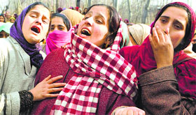 Women mourn the death of a Hizbul Mujahideen militant in Anantnag district on Tuesday.